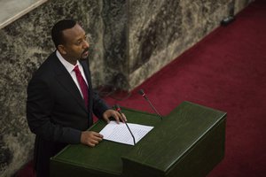 In this Monday, April 2, 2018 file photo, Abiy Ahmed, the newly elected chair of the Ethiopian Peoples' Revolutionary Democratic Front (EPRDF) addresses Ethiopian lawmakers after he was sworn in as the country's Prime Minister in Addis Ababa