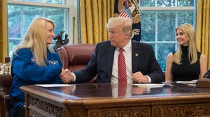 President Donald Trump, joined by NASA astronaut Kate Rubins, left, and First Daughter Ivanka Trump, talks with NASA astronauts Peggy Whitson and Jack Fischer onboard the International Space Station Monday, April 24, 2017 from the Oval Office of the White House in Washington.