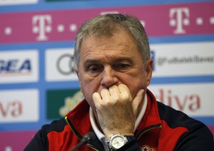 Montenegro coach Ljubisa Tumbakovic listens to a question during a press conference in Podgorica, Montenegro, Sunday March 24, 2019, ahead of the Euro 2020 group A qualifying soccer match between Montenegro and England on Monday