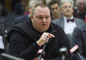 Internet entrepreneur Kim Dotcom speaks during the Intelligence and Security select committee hearing at Parliament in Wellington, New Zealand