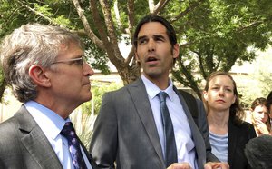 Scott Warren speaks outside federal court in Tucson, Ariz., after a mistrial was declared in the federal case against him Tuesday, June 11, 2019.