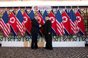 File - President Donald J. Trump is greeted by Kim Jong Un, Chairman of the State Affairs Commission of the Democratic People’s Republic of Korea Wednesday, Feb. 27, 2019, at the Sofitel Legend Metropole hotel in Hanoi, for their second summit meeting.