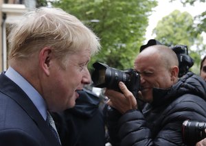 British Conservative Party lawmaker Boris Johnson leaves his home in London, Thursday, June 13, 2019.