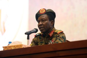 Sudan's ruling Military Council spokesperson Shamseddine Kabbashi makes a speech as he holds a press conference at the Presidential Palace in Khartoum, Sudan, Thursday, June 13, 2019.