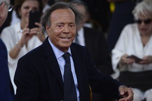 Spanish singer Julio Iglesias smiles during his star unveiling ceremony at the Walk of Fame in San Juan, Puerto Rico, Thursday, Sept. 29, 2016.