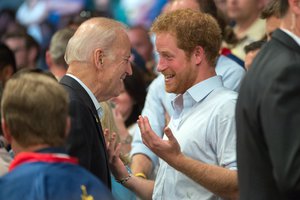 Vice President Joe Biden and Prince Harry meet in the stands of a wheelchair rugby match at the 2016 Invictus Games in Orlando, Florida, United States