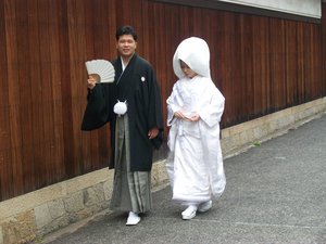 Traditional Japanese wedding Kimonos in Bikan District Kurashiki, Japan.