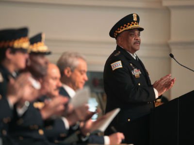 Chicago Police Superintendent Eddie Johnson stands at a podium