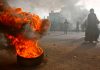 Tire on fire in the streets of Khartoum