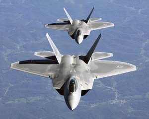 Two F-22s during flight testing, the upper one being the first EMD F-22, "Raptor 01". The United States Air Force originally planned to order 750 ATFs, with production beginning in 1994; however, the 1990 Major Aircraft Review altered the plan to 648 aircraft beginning in 1996