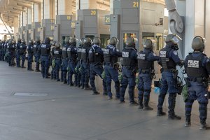 File - U.S. Customs and Border Protection personnel along with DOD personnel secure the San Ysidro Port of Entry against attempts to illegally enter the United States from Mexico.