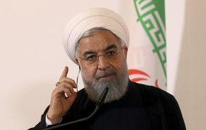 Iranian President Hassan Rouhani speaks during a joint news conference as part of a meeting with Austria's Chancellor Sebastian Kurz at the federal chancellery in Vienna, Austria, Wednesday, July 4, 2018.