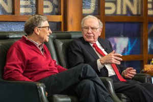 Microsoft co-founder and Berkshire board member Bill Gates, left, and Berkshire Hathaway Chairman and CEO Warren Buffett, right, during an interview with Liz Claman, unseen, on the Fox Business Network. in Omaha