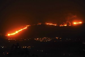 A wild fire burnt a forrest near Gondomar, Pontevedra, in the northwestern Spanish region of Galicia, Spain on Monday, Oct. 16, 2017.