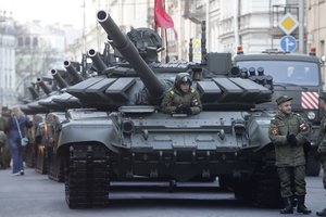 Russian T-72 tanks stand in line prior to a rehearsal for the Victory Day military parade which will take place at Dvortsovaya (Palace) Square on May 9 to celebrate 73 years after the victory in WWII, in St.Petersburg, Russia, Monday, April 30, 2018.