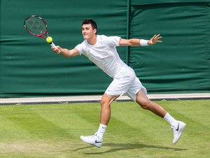 Bernard Tomic in the first round of the 2013 Wimbledon Championships