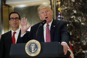 President Donald Trump speaks to the media in the lobby of Trump Tower, Tuesday, Aug. 15, 2017.  (AP Photo/Pablo Martinez Monsivais)