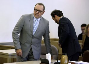 Actor Kevin Spacey arrives with his attorney Alan Jackson, right, for a pretrial hearing on Monday, June 3, 2019, at district court in Nantucket, Mass.