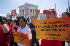 Demonstrators gather at the Supreme Court as the justices finish the term with key decisions on gerrymandering and a census case involving an attempt by the Trump administration to ask everyone about their citizenship status in the 2020 census, on Capitol Hill in Washington, Thursday, June 27, 2019.  (AP Photo/J. Scott Applewhite)