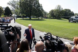 President Donald J. Trump talks to reporters outside the South Portico entrance of the White House Friday, July 5, 2019, prior to boarding Marine One to begin a weekend trip to Bedminster, N.J.