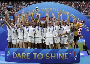 United States' team celebrates with trophy after winning the Women's World Cup final soccer match