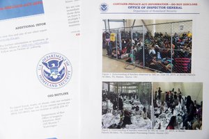 A report from government auditors reveals images of people penned into overcrowded Border Patrol facilities, including one man pressing a cardboard sign to a cell window with the word “help.” is photographed at the Associated Press Bureau, Tuesday, July 2, 2019, in Washington. The report released Tuesday by the Department of Homeland Security’s Office of Inspector General warns that facilities in South Texas’ Rio Grande Valley face “serious overcrowding” and require “immediate attention.” (AP Photo/Andrew Harnik)