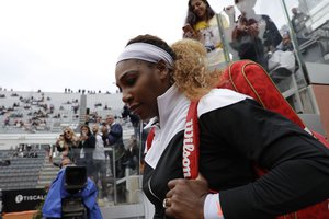 Serena Williams, of the United States, enters the central court to start her match against Sweden's Rebecca Peterson at the Italian Open tennis tournament, in Rome, Monday, May, 13, 2019.