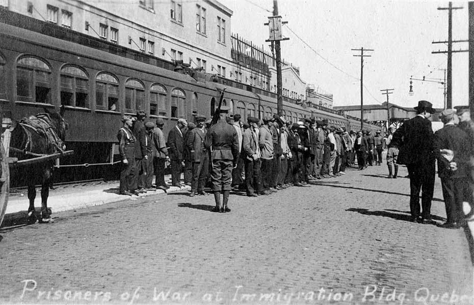 Internees at the Montreal receiving station.  Uses size