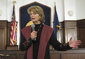 U.S. Sen. Lisa Murkowski speaks to reporters after delivering a speech to a joint session of the Alaska Legislature on Tuesday, Feb. 19, 2019, in Juneau, Alaska.