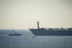 A view of the Grace 1 super tanker near a Royal Marine patrol vessel in the British territory of Gibraltar, Thursday, July 4, 2019.