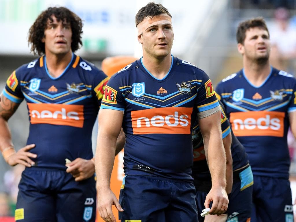 Ryley Jacks  of the Titans (centre) looks on following a Sea Eagles try during the Round 15 NRL match between the Gold Coast Titans and the Manly Sea Eagles at CBus Super Stadium on the Gold Coast, Saturday, June 29, 2019. (AAP Image/Dave Hunt) NO ARCHIVING, EDITORIAL USE ONLY