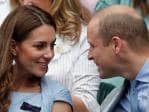 Britain's Prince William (R), Duke of Cambridge and Britain's Catherine, Duchess of Cambridge, watch Switzerland's Roger Federer playing Serbia's Novak Djokovic during their men's singles final on day thirteen of the 2019 Wimbledon Championships at The All England Lawn Tennis Club in Wimbledon, southwest London, on July 14, 2019. (Photo by Adrian DENNIS / POOL / AFP) / RESTRICTED TO EDITORIAL USE