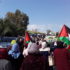 Women marching toward Khan al-Ahmar