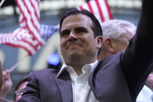 Puerto Rico Governor Ricardo Rossello celebrates the results of a referendum on the status of the island, at the New Progressive Party headquarters in San Juan, Puerto Rico, Sunday, June 11, 2017