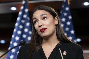 Rep. Alexandria Ocasio-Cortez, D-N.Y., responds to base remarks by President Donald Trump after his call for four Democratic congresswomen of color to go back to their "broken” countries, as he exploited the nation’s glaring racial divisions once again for political gain, during a news conference at the Capitol in Washington, Monday, July 15, 2019.