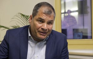 Former President of Ecuador Rafael Correa speaks during an interview with The Associated Press in Brussels, Thursday, April 11, 2019.