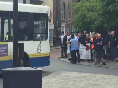 EDL huddle on a street corner.