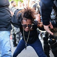 Police detain protesters at a rally against police violence following the death of 19-year-old Solomon Tekah in Tel Aviv, July 3, 2019. (Neuberg/Flash90)