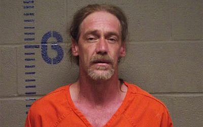 Stephen Jennings after police say they found in his car a rattlesnake, a canister of radioactive powdered uranium and an open bottle of Kentucky Deluxe whiskey during a traffic stop. (Logan County, Oklahoma Sheriff's Office via AP)