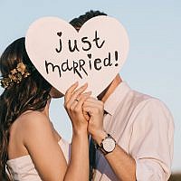 Illustrative image of a bride and groom. (LightFieldStudios/ iStock by Getty Images)