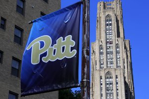 The Cathedral of Learning, right, towers over the University of Pittsburgh campus in the Oakland section of Pittsburgh Monday, July 8, 2019.