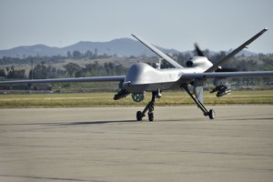 An Unmanned aerial vehicle (drone) General Atomics MQ-9 Reaper remotely piloted aircraft assigned to the 163d Attack Wing taxis at March Air Reserve Base, California