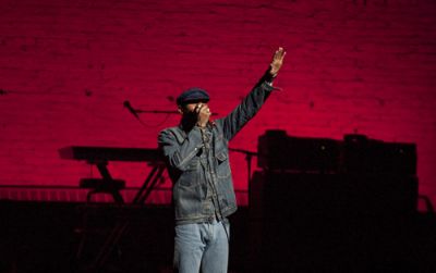 SPEAKING UP: Performers Mos Def (above) and Liza Garza (below) highlight Muslim art and culture at the Inner-City Muslim Action Network show at the Apollo Theater Jan. 23. PHOTOS: ANDREW HINDERAKER