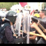 Shenzhen anti-riot police crack down on a simulated protest at Waterfront Square on Tuesday.