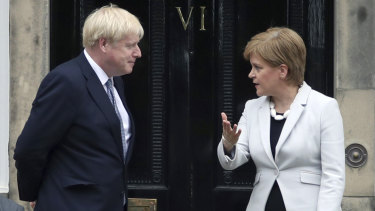 Scotland's First Minister Nicola Sturgeon greets Britain's Prime Minister Boris Johnson. 