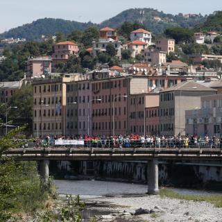 A rose for each of the 43 victims of the bridge collapse was tossed into the Polcevera river on the first anniversary of the disaster