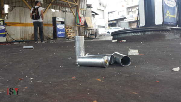 Rifle-fired tear gas canister shells used against unarmed Palestinian youth in the streets of Bab al-Zawiye in occupied Hebron. These crowd-control weapons are bought with money from US aid packages to Israel, usually directly from US arms companies.