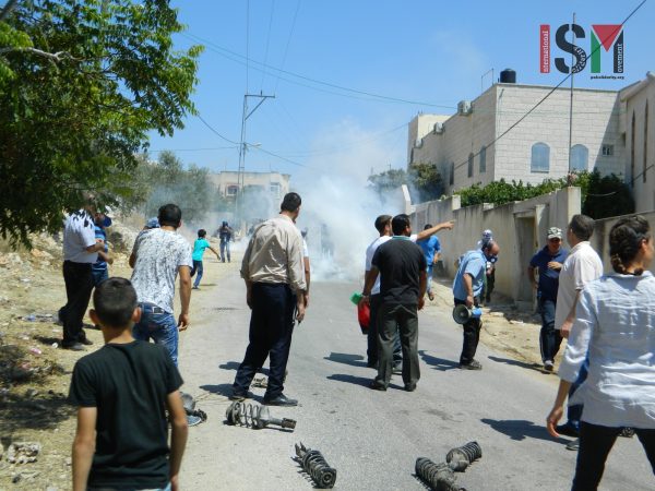 Israeli forces teargassing Paletsinian demonstrators