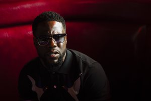 Actor-comedian Kevin Hart speaks with members of the media