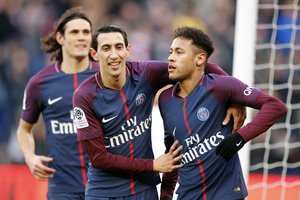 PSG's Neymar celebrates his goal against Strasbourg with Angel Di Maria during the French League One soccer match between Paris Saint Germain and Strasbourg, at the Parc des Princes stadium in Paris, France, Saturday, Feb. 17, 2018.